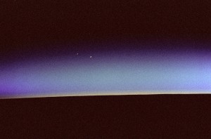 View of Earth limb horizon during sunrise with Mars and Venus rising.