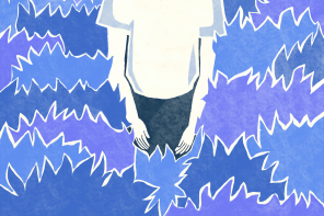 A person's torso surrounded by blue, spiky abstract shapes